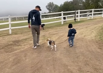 Archie is seen walking Guy in the video tribute