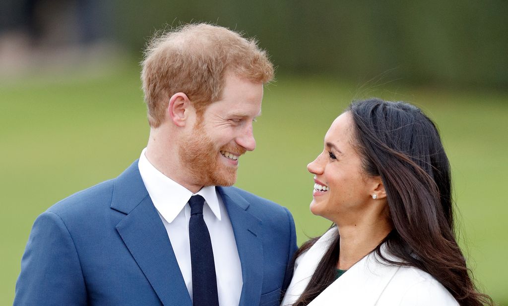 Prince Harry and Meghan Markle attend an official photocall to announce their engagement at The Sunken Gardens, Kensington Palace on November 27, 2017 in London, England.  Prince Harry and Meghan Markle have been a couple officially since November 2016 