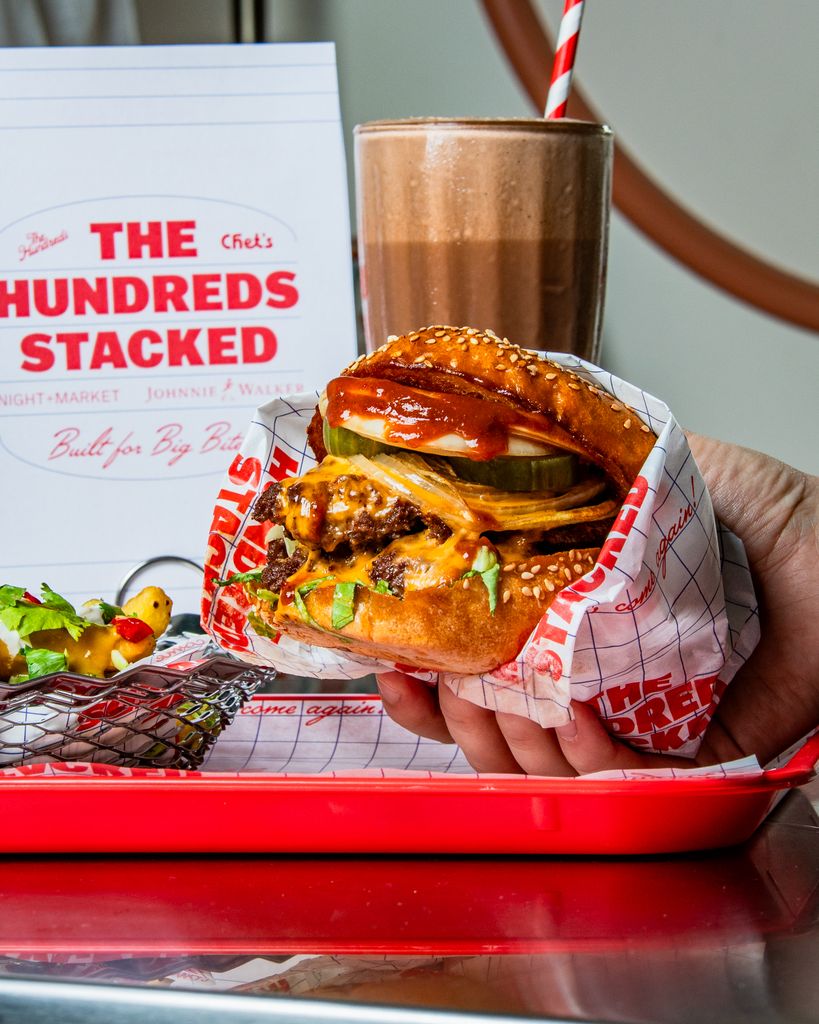 burger in wrapper on diner tray