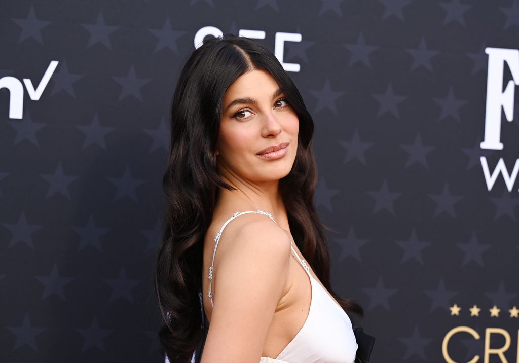 Camila Morrone smiling on the red carpet at the Critics' Choice Awards 
