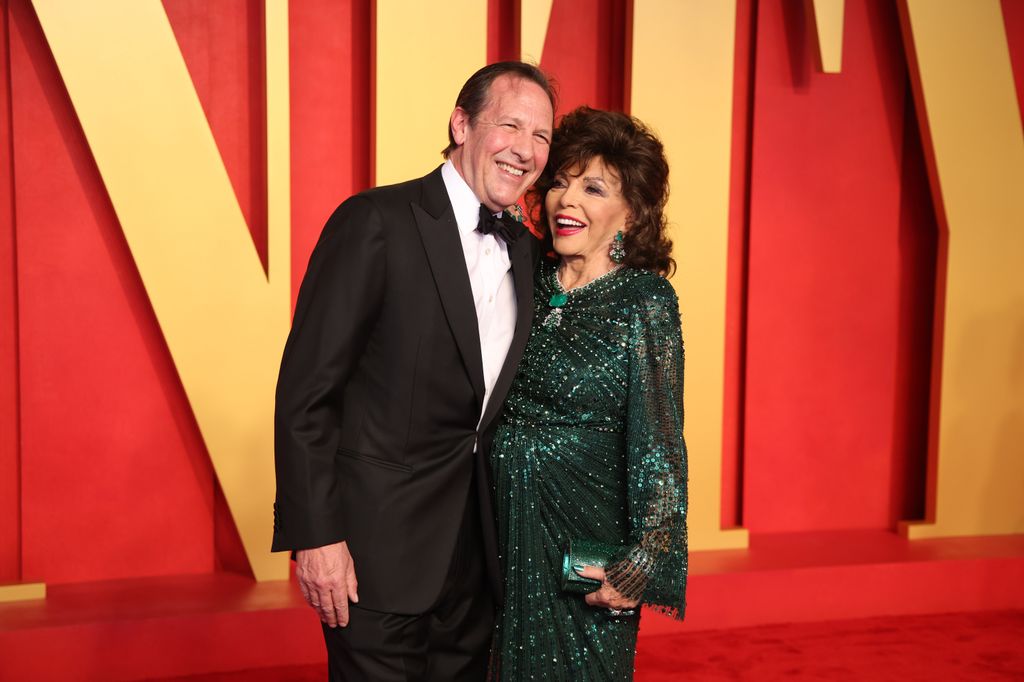 couple posing on red carpet