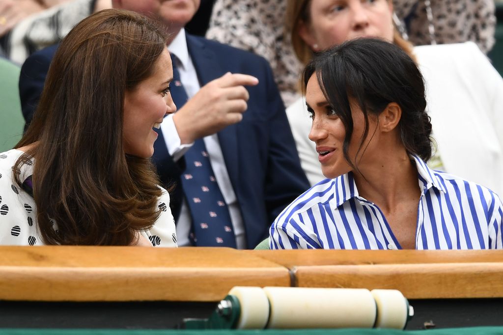 Princess Kate and Meghan Markle sat in the royal box at Wimbledon in 2019
