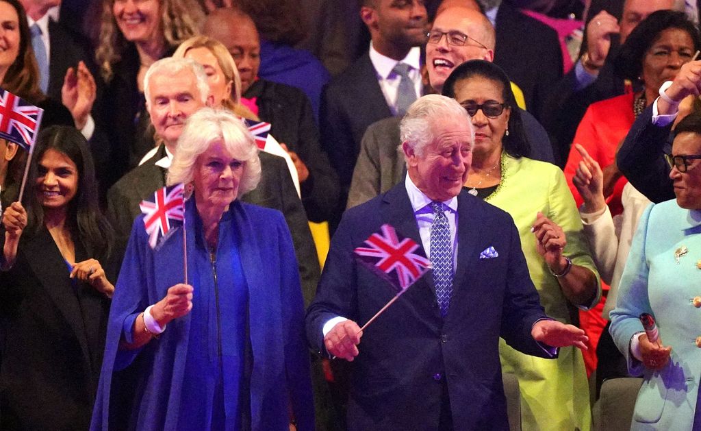 King Charles waves his flag at Coronation Concert