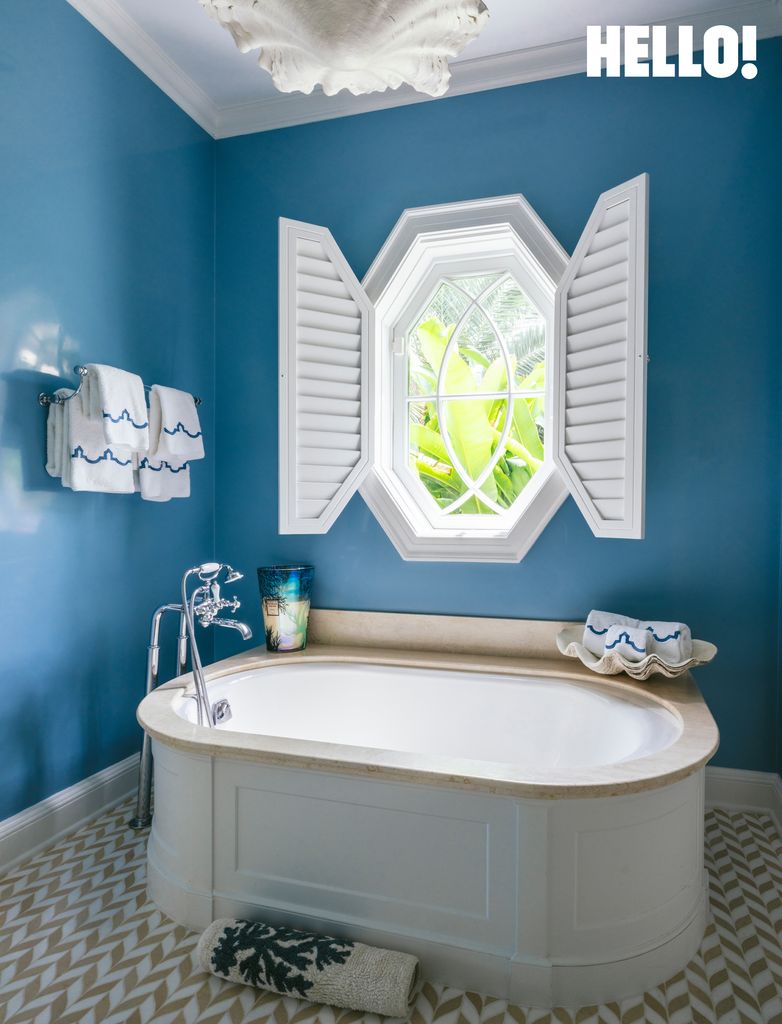 One of the blue-toned bathrooms in the Palm Beach mansion