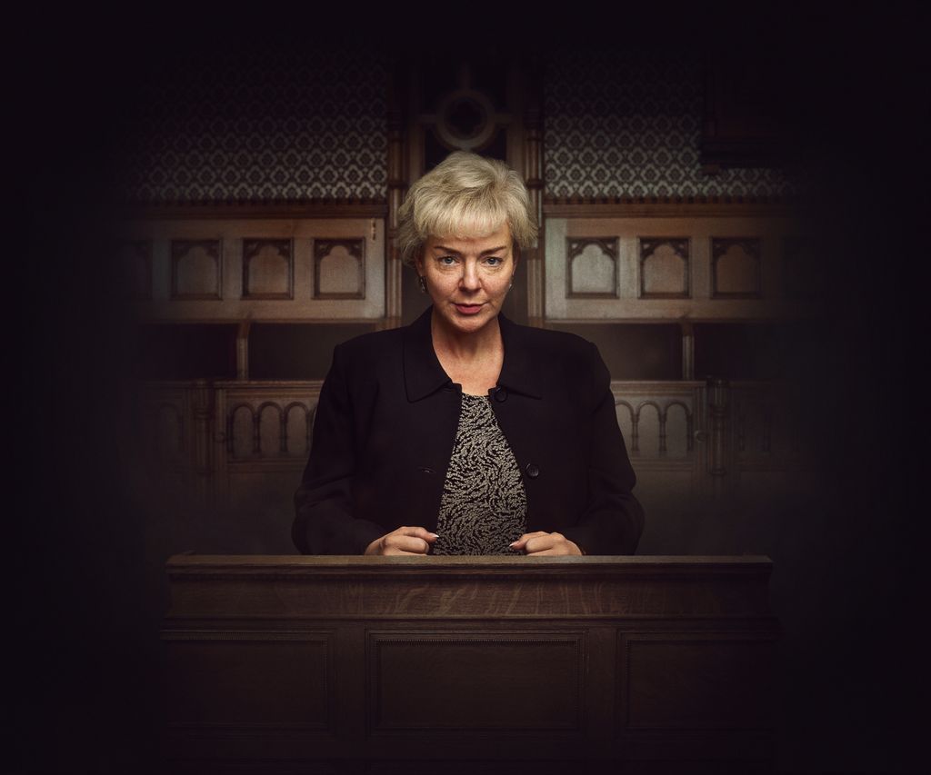 woman standing in court dock