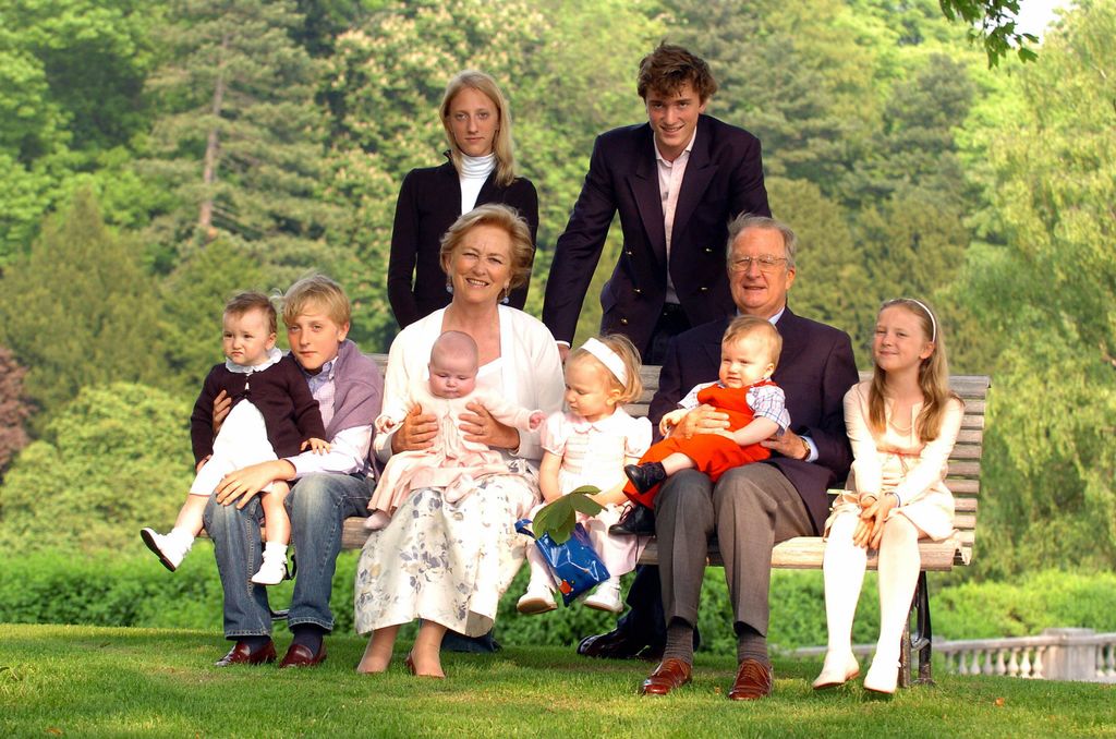 Queen Paola and King Albert II pose with their grandchildren in 2004