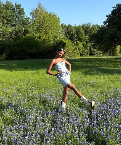 simone ashley in denim mini dress