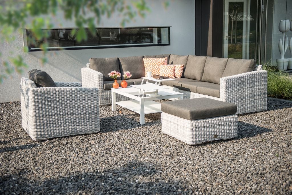 A garden patio with outdoor sofa set