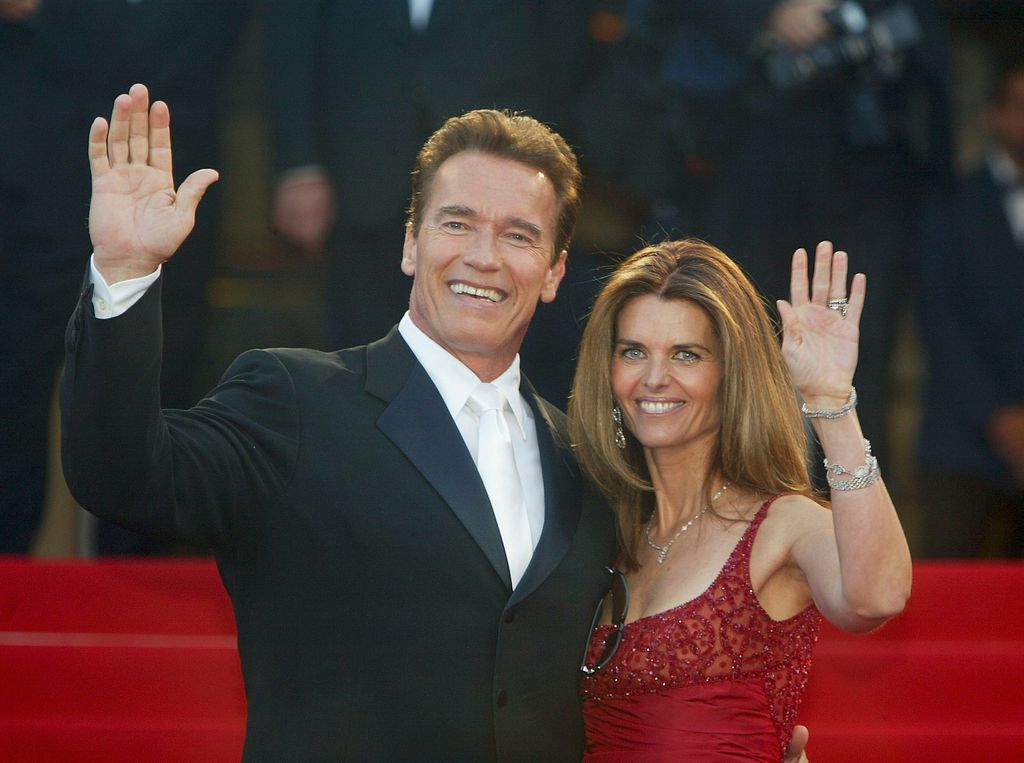 Arnold Schwarzenegger with his wife Maria Shriver wave to fans May 16, 2003 in Cannes, France