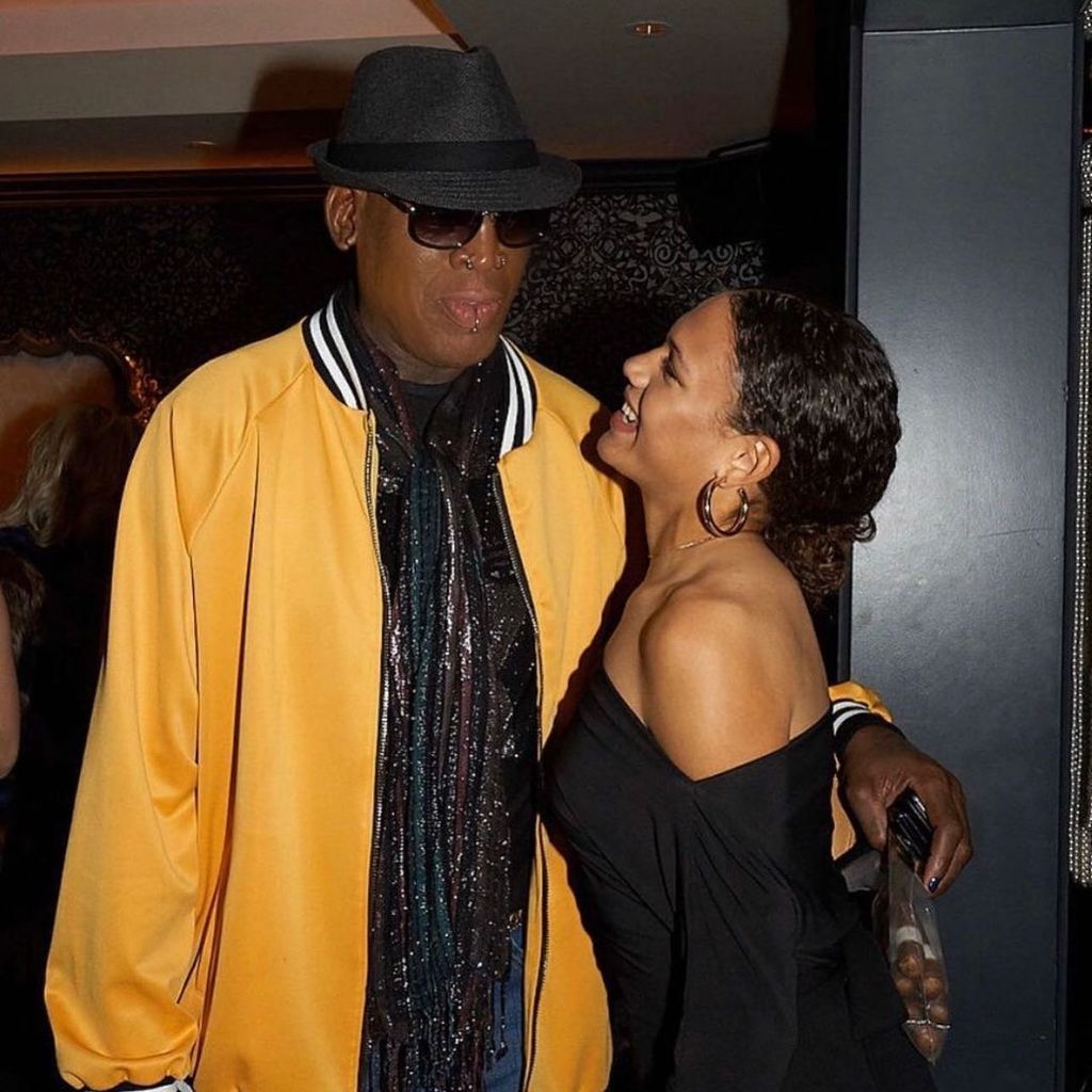 Trinity Rodman (right) poses with her father Dennis Rodman