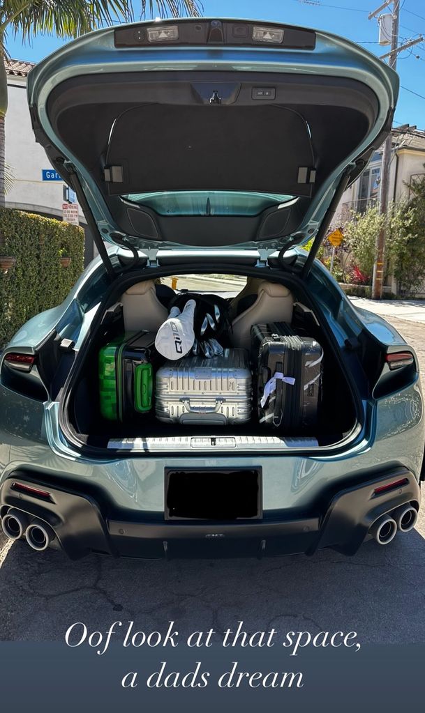 Back of a car packed with items 