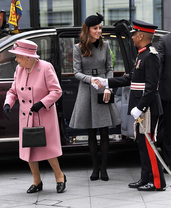 kate middleton shakes hands engagement queen