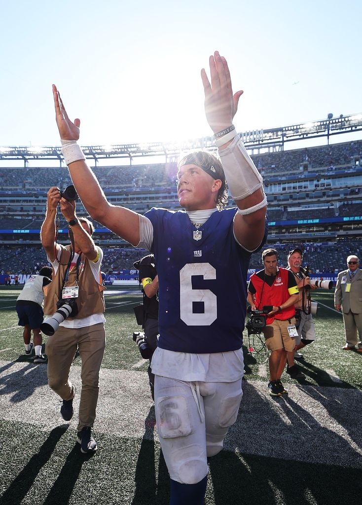 Jaxson Dart #6 of the New York Giants celebrates a win against the Los Angeles Chargers after the game at MetLife Stadium on September 28, 2025 in East Rutherford, New Jersey