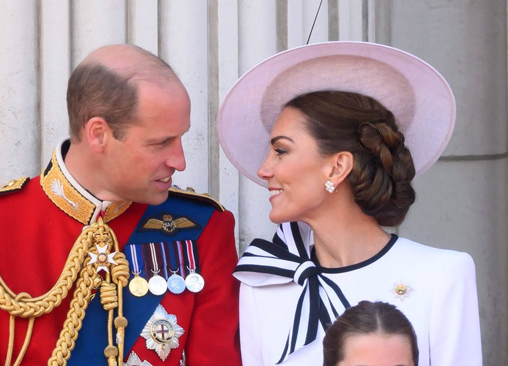 Prince William and kate middleton look at each other