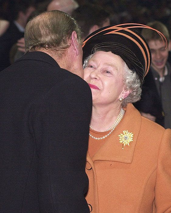 queen and prince philip kiss