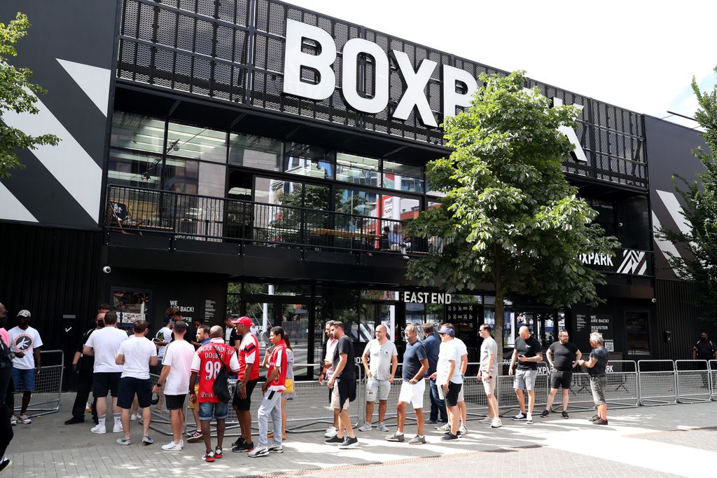 General view outside the stadium as fans are seen lining up to get into 'BOXPARK'