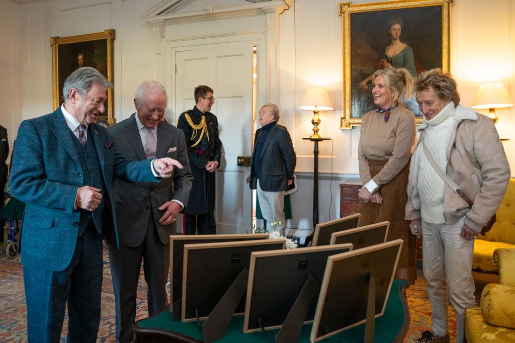 Alan Titchmarsh laughing with King Charles - Penny Lancaster and Rod Stewart stand to the side while David Armstrong-Jones can be seen in the background