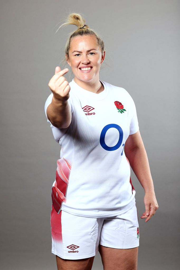 Marlie Packer holding hand up in rugby kit