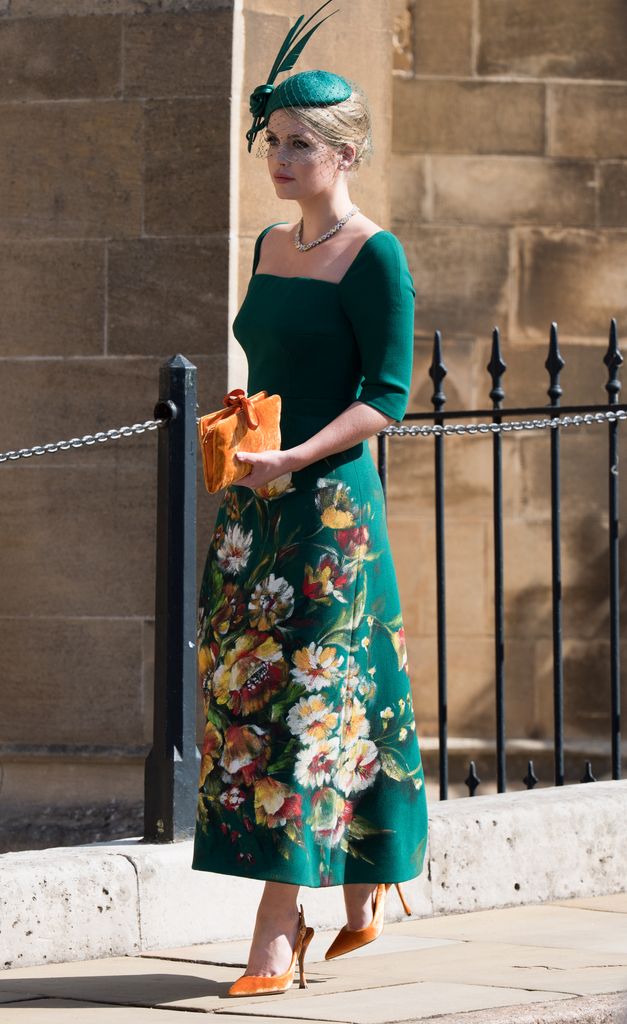 Lady Kitty Spencer in a green dress and orange heels at Prince Harry's wedding