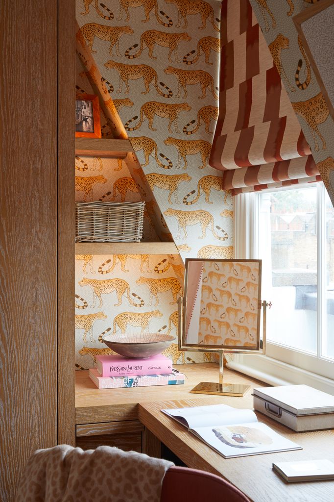 corner of home with window blind and shelves 