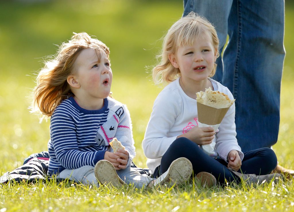 Isla and her cousin Mia, daughter of Zara Tindall, grab a bite to eat together at an equestrian event in March 2017.