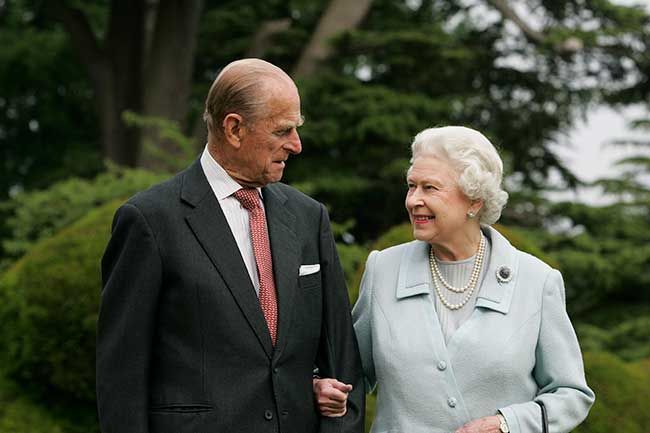 Prince Philip and Queen Elizabeth II look lovingly at each other