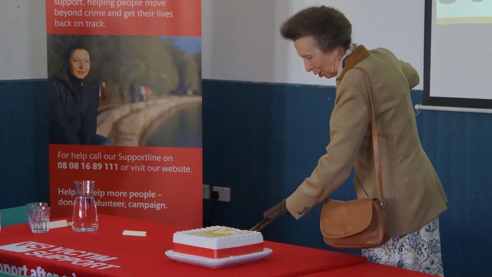 The Princess Royal wore her suede-collar jacket over a printed tea dress