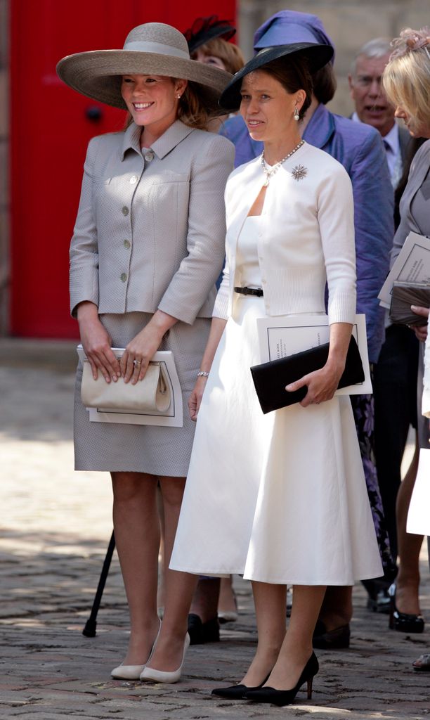 Lady Sarah Chatto in a white dress next to Autumn Phillips