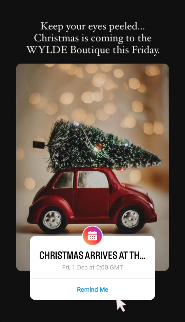A toy car with a Christmas tree on top