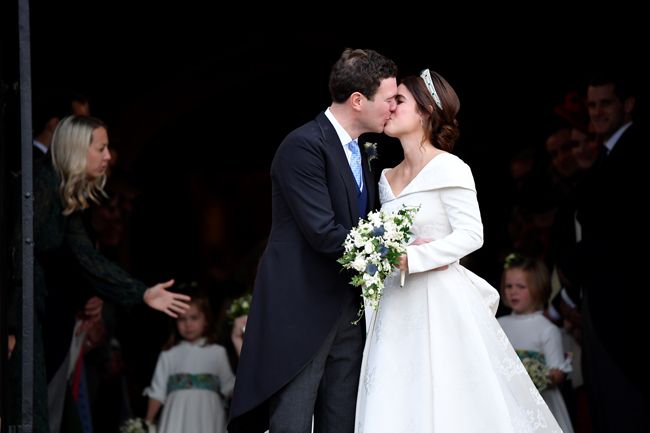 princess eugenie kissing husband jack on wedding day 