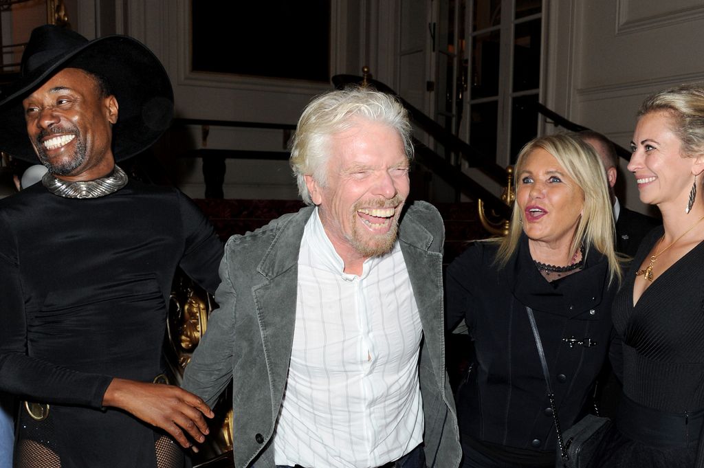 Billy Porter, Richard Branson, Joan Branson and Holly Branson with their arms around each other