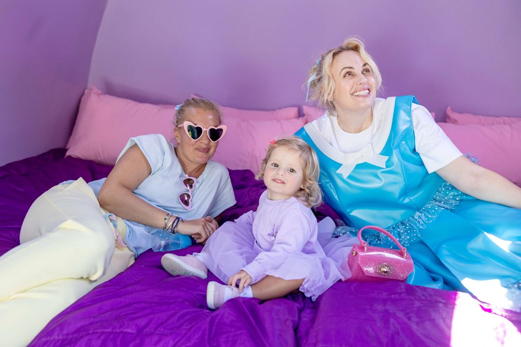 Rebel's little girl looked delighted with the purple-hued pocket home