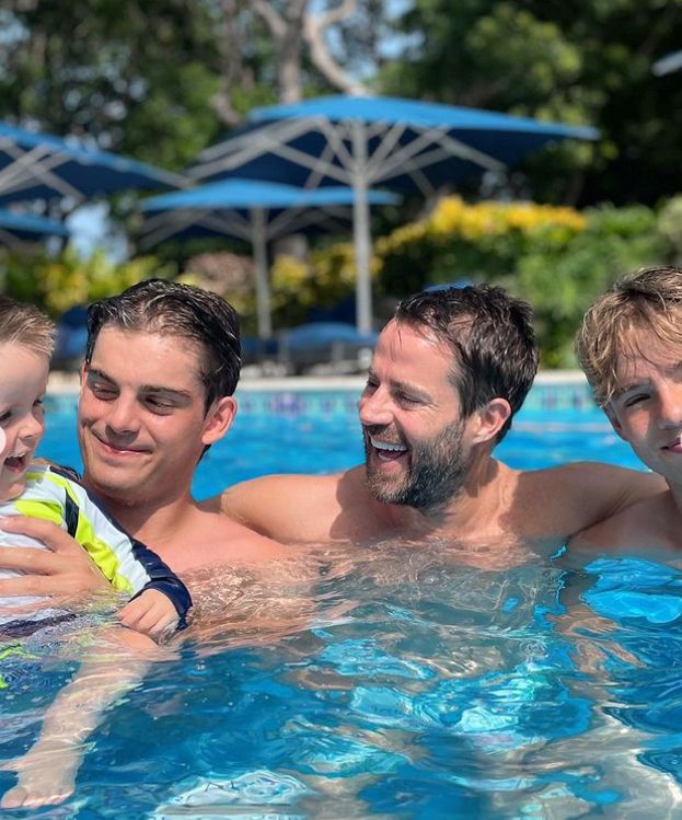 Jamie Redknapp and his three sons in a swimming pool