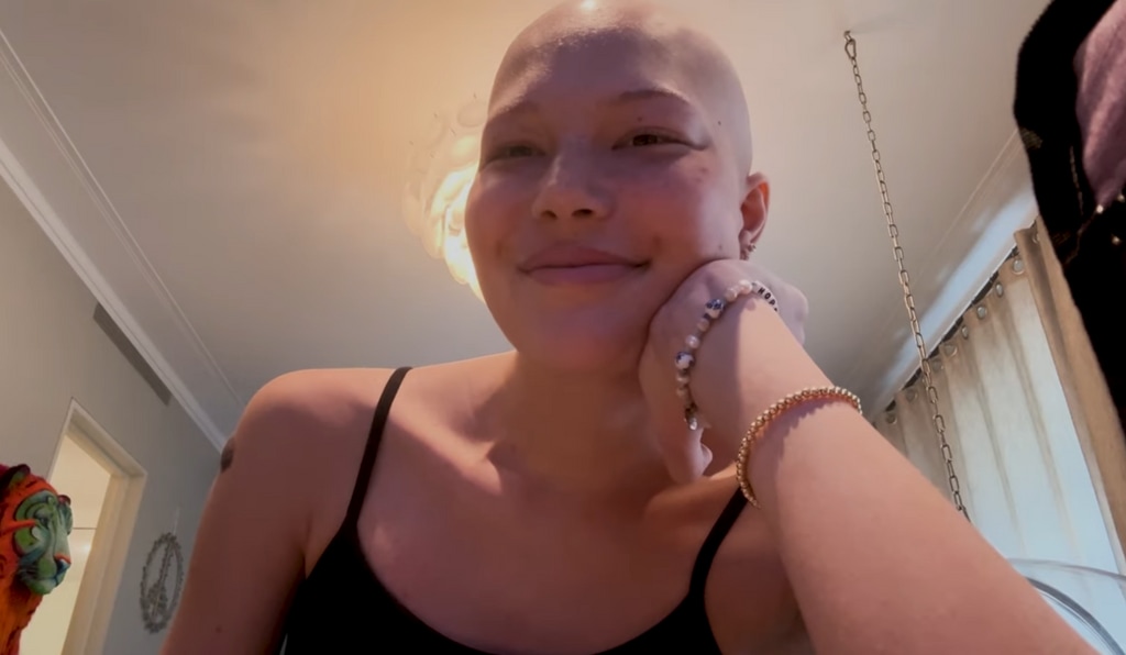 Still from a YouTube video shared by Michael Strahan's daughter Isabella Strahan on April 10, 2024, announcing she only had two more rounds of chemotherapy left