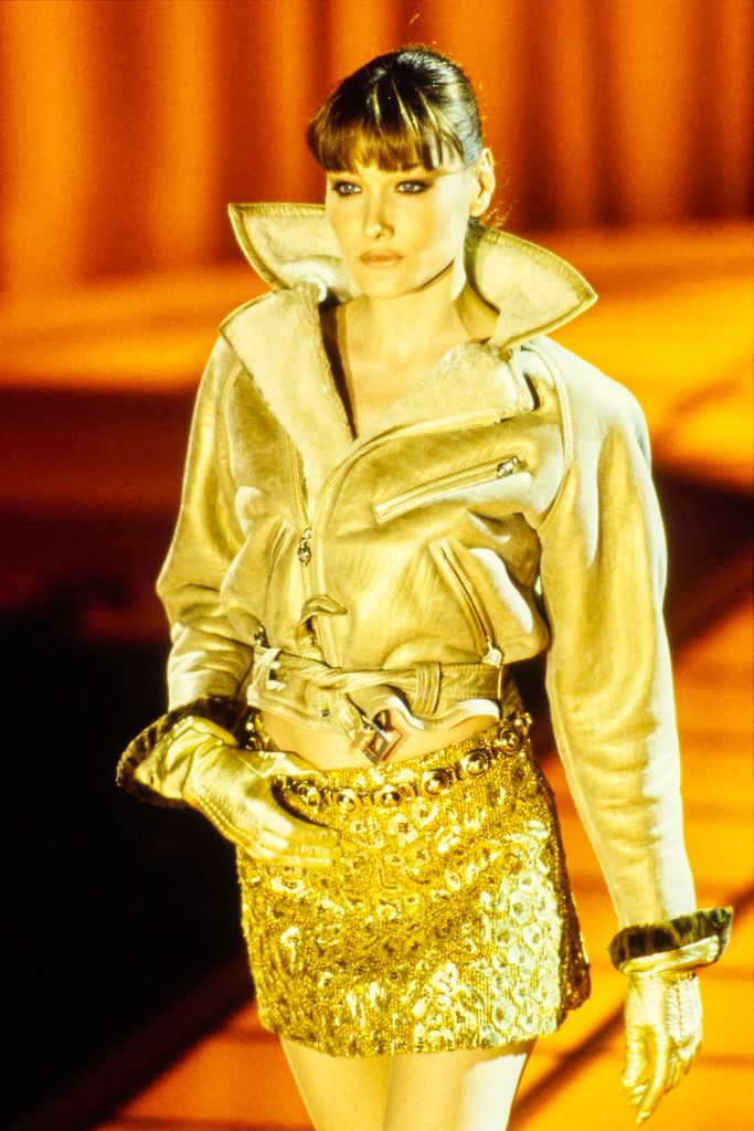 Carla Bruni walks for Versace's autumn/winter 1994 runway collection