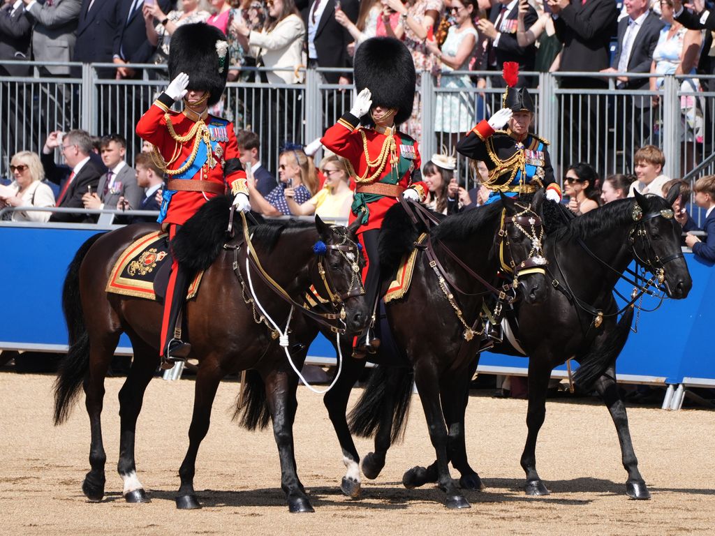 William, Edward and Anne saluting during the procession