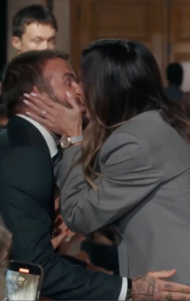 Victoria greeted David with a kiss at the end of the runway