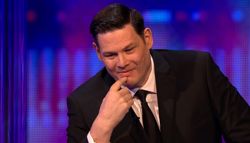 Mark Labbett in a suit while filming for The Chase