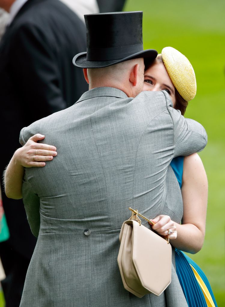 Mike Tindall hugging Princess Eugenie