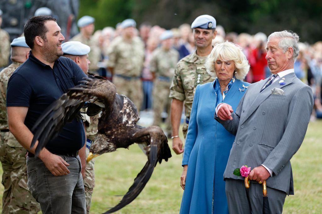charles and camilla with eagle