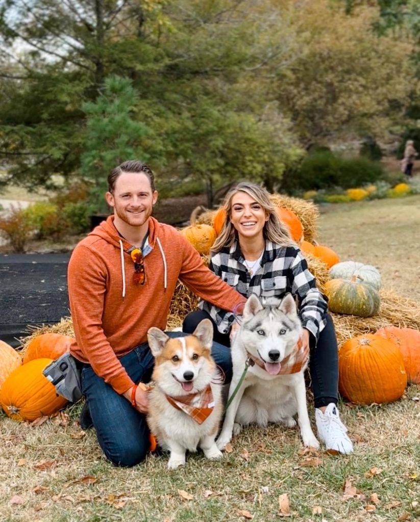 shelby blackstock and wife marissa with two pet dogs