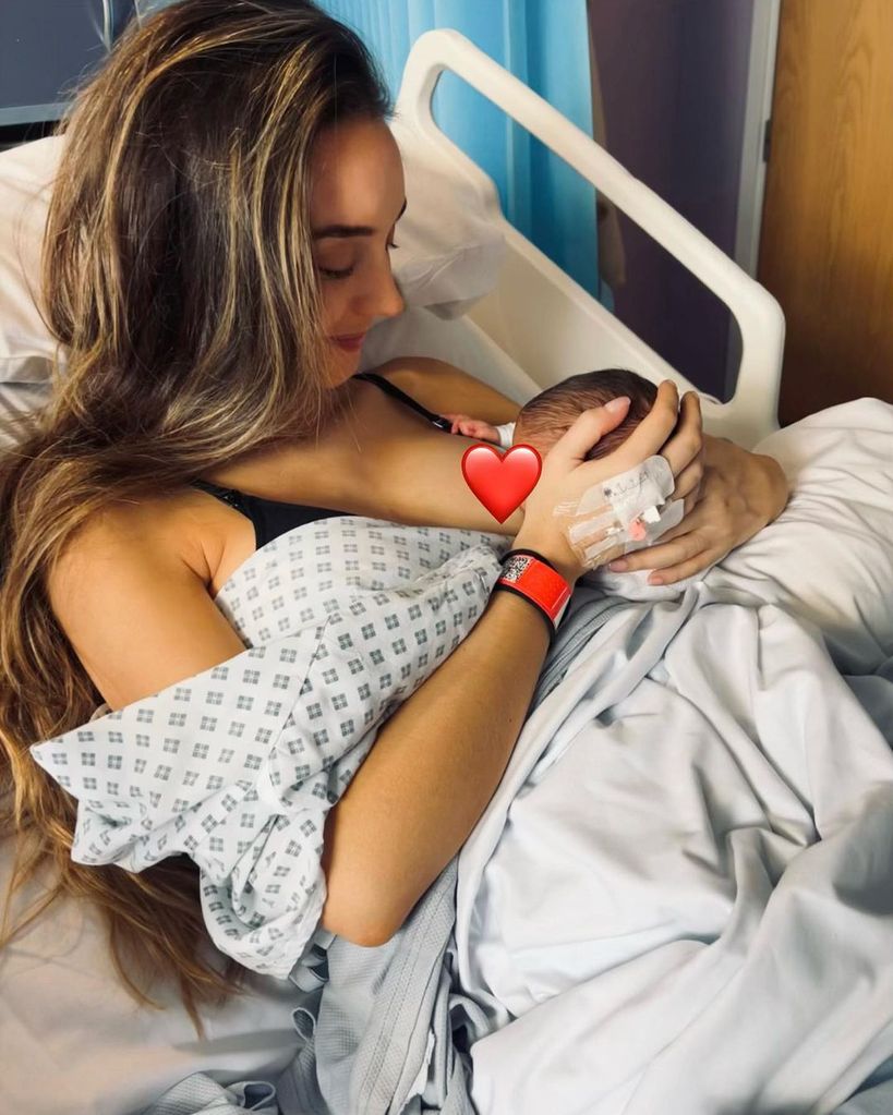 Emily Andre breastfeeding baby Arabella