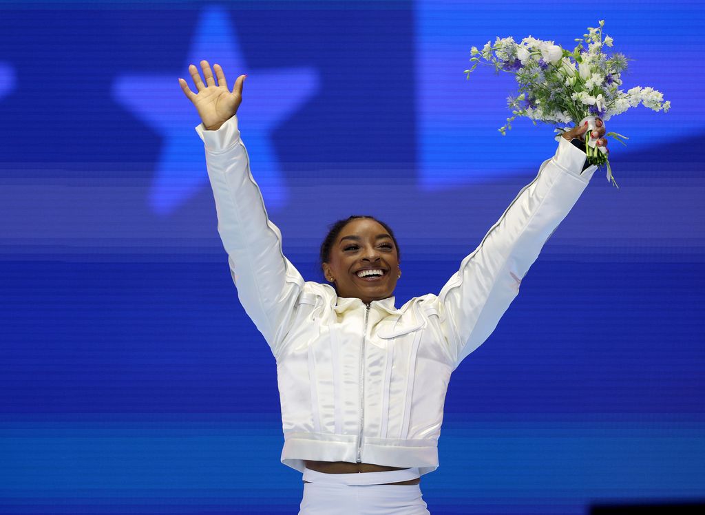 Simone Biles celebrates as she is announced as a member of the Olympic Team on Day Four of the 2024 U.S. Olympic Team Gymnastics Trials at Target Center on June 30, 2024 in Minneapolis, Minnesota. 