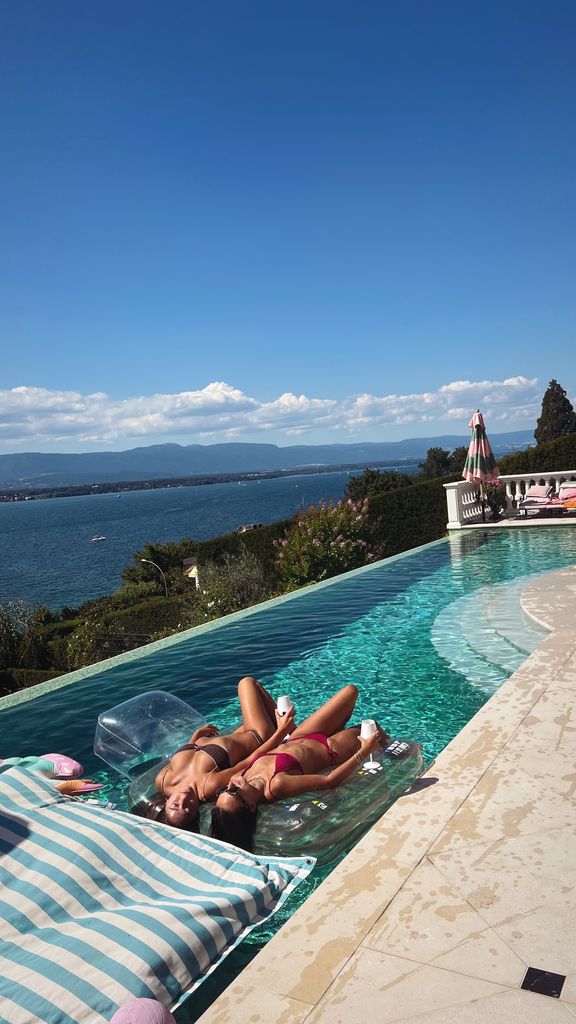 Lola Consuelos lounges on a pool float with a friend in a bikini on vacation, shared on Instagram