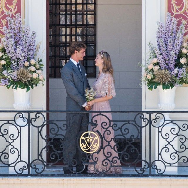 Beatrice Borromeo in a pink wedding dress with her husband