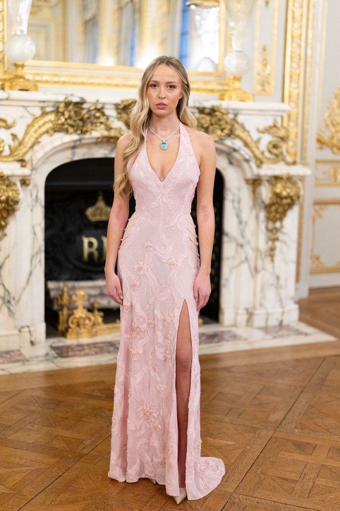 Ruby Kemper posed in pink dress at ball