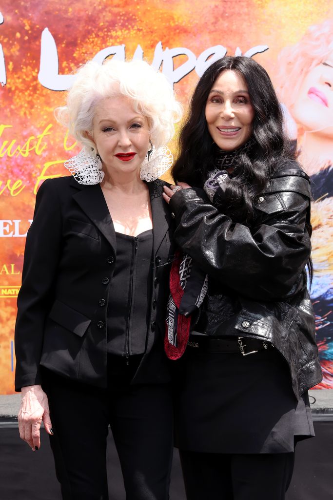 HOLLYWOOD, CALIFORNIA - JUNE 04: (L-R) Cyndi Lauper and Cher attend the Cyndi Lauper Hand and Footprint in Cement Ceremony at TCL Chinese Theatre Hollywoodat TCL Chinese Theatre on June 04, 2024 in Hollywood, California. (Photo by Amy Sussman/Getty Images)