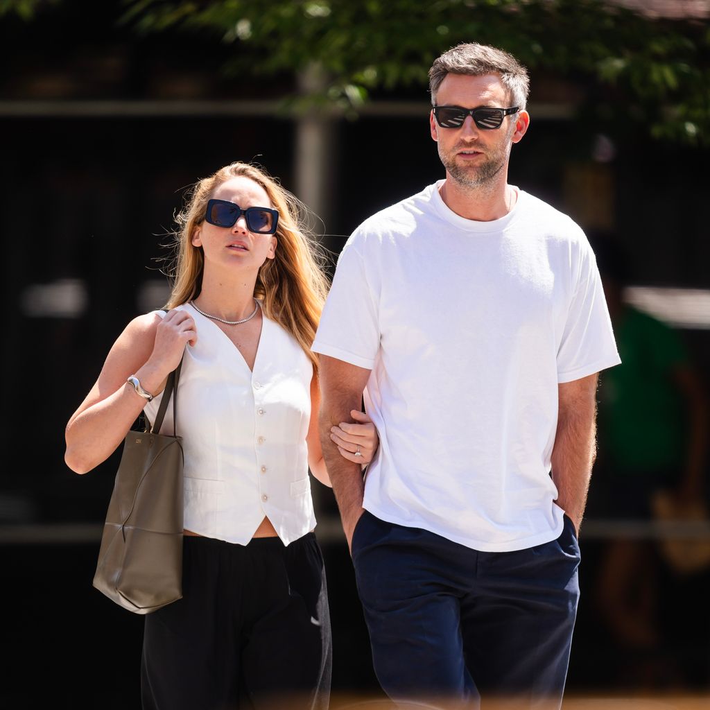 Jennifer Lawrence walking with husband Cooke Maroney