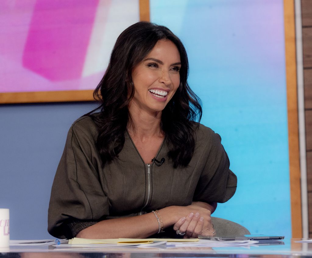 Christine laughs as she presents Loose Women