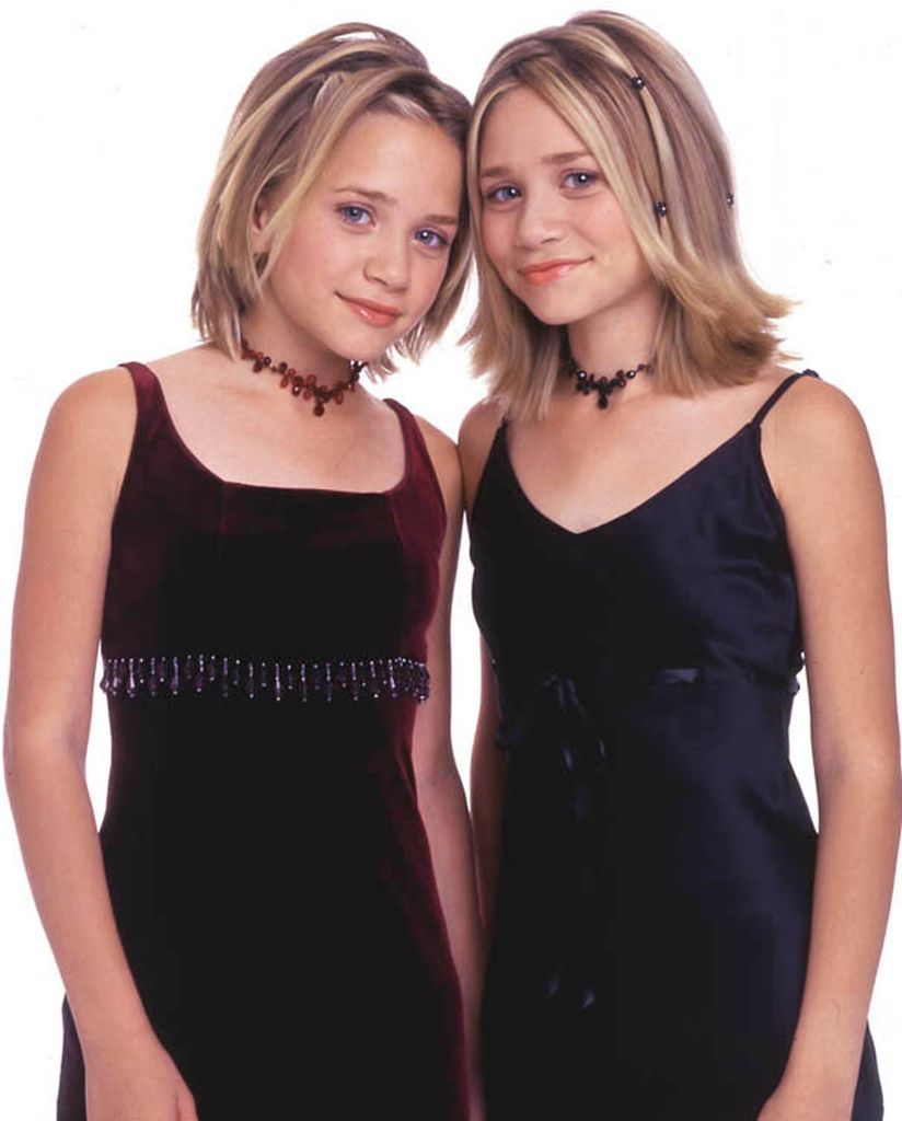  Mary-Kate and Ashley Olsen are launching a pocket planner in 2000 in black dresses